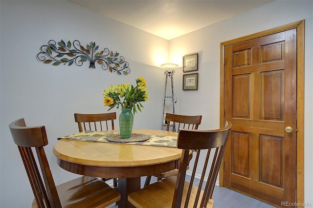 dining area featuring wood finished floors