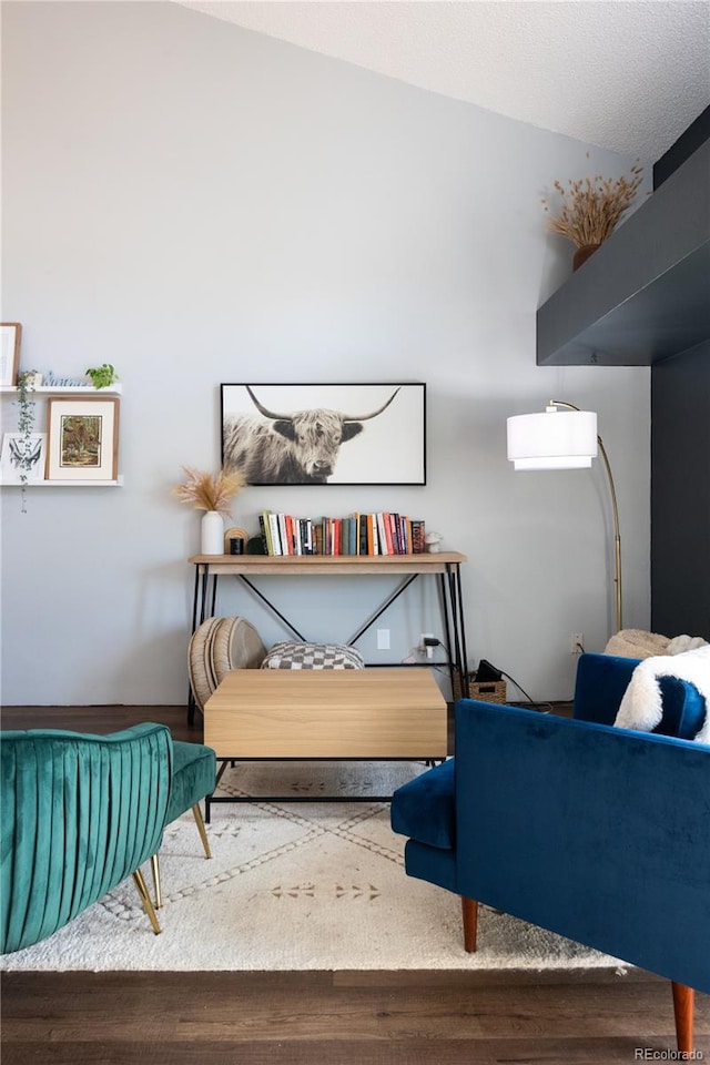 sitting room featuring wood finished floors