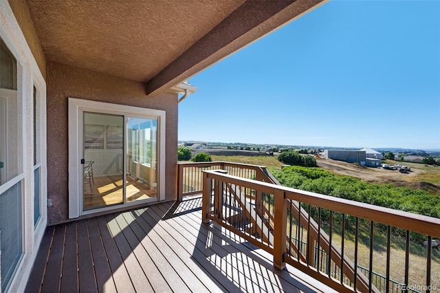 178 Coyote Willow, Colorado Springs, CO 80921 - view of wooden balcony with a deck