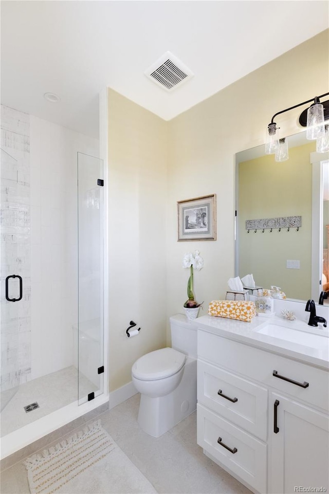 bathroom featuring toilet, walk in shower, tile patterned floors, and vanity