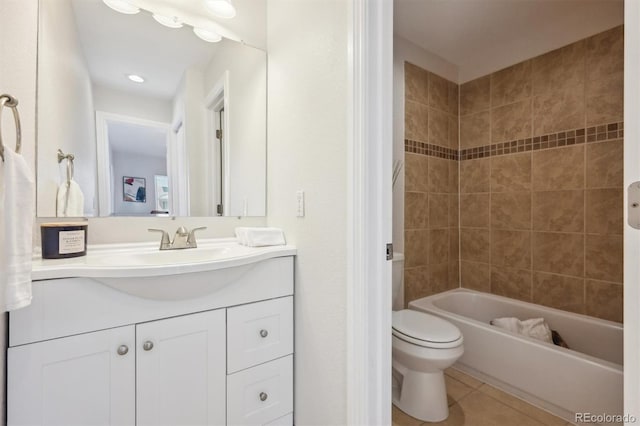 2285 Fulton St, Aurora, CO 80010 - full bathroom featuring vanity, toilet, shower / bath combination, and tile patterned floors