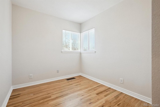 2285 Fulton St, Aurora, CO 80010 - empty room with light wood-type flooring and baseboards