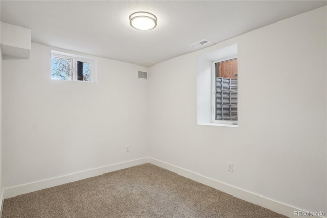 basement with carpet flooring