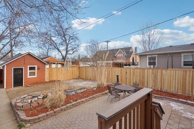 view of patio featuring an outdoor structure