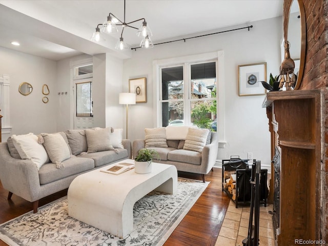 1423 Elizabeth St, Denver, CO 80206 - living area with a chandelier, light wood-type flooring, and recessed lighting