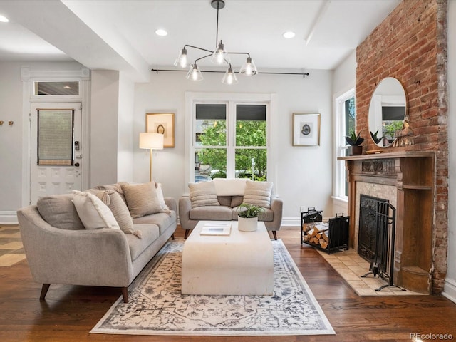 1423 Elizabeth St, Denver, CO 80206 - living area with wood finished floors, a fireplace, baseboards, and recessed lighting