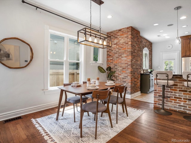 1423 Elizabeth St, Denver, CO 80206 - dining room with baseboards, light wood-style flooring, and recessed lighting