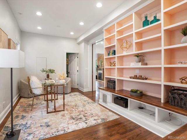 1423 Elizabeth St, Denver, CO 80206 - sitting room with wood finished floors, recessed lighting, and baseboards