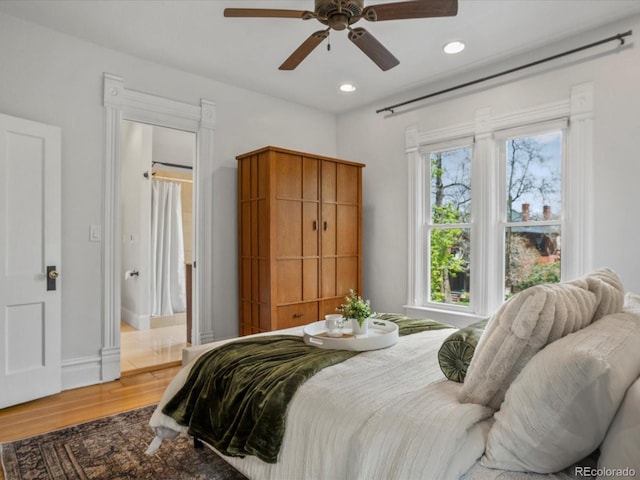 1423 Elizabeth St, Denver, CO 80206 - bedroom featuring wood finished floors, recessed lighting, a ceiling fan, and baseboards