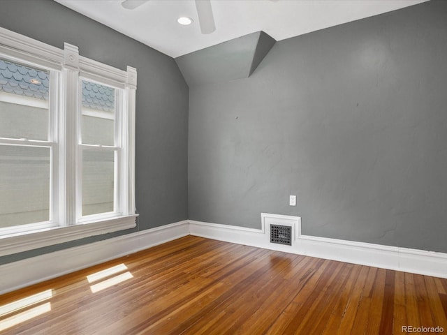1423 Elizabeth St, Denver, CO 80206 - unfurnished room featuring ceiling fan, hardwood / wood-style flooring, baseboards, and lofted ceiling