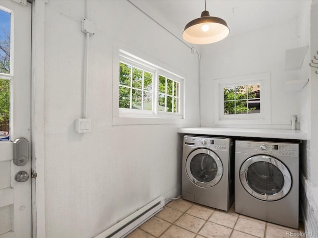 1423 Elizabeth St, Denver, CO 80206 - laundry room with independent washer and dryer, plenty of natural light, and light stone finish flooring
