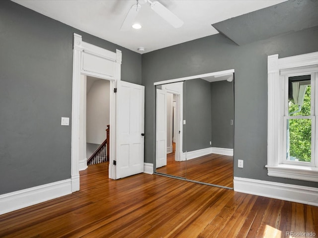 1423 Elizabeth St, Denver, CO 80206 - unfurnished room with wood finished floors, baseboards, ceiling fan, and a smoke detector