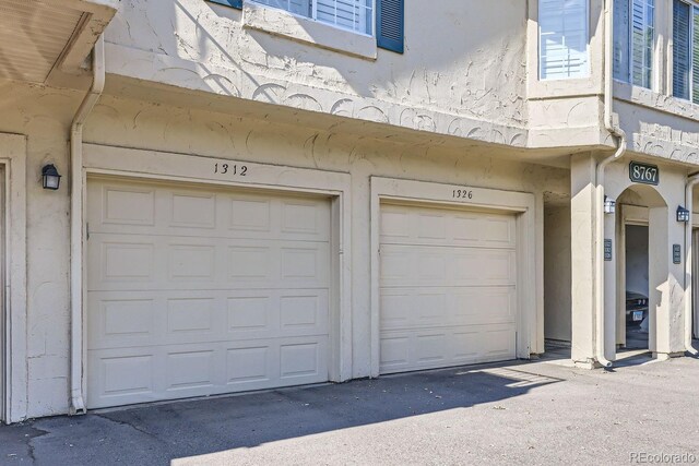8767 E Dry Creek Rd Unit 1312, Englewood, CO 80112 - view of garage