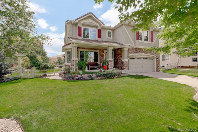 view of front of property featuring a front yard and a garage