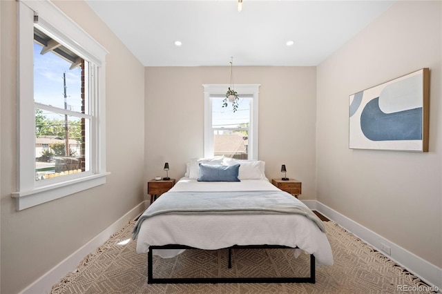 bedroom with baseboards and recessed lighting