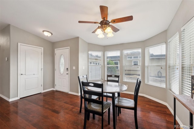 4481 Kingfisher Pt, Colorado Springs, CO 80922 - dining space featuring wood finished floors, a ceiling fan, and baseboards