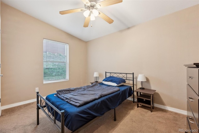 4481 Kingfisher Pt, Colorado Springs, CO 80922 - bedroom with light carpet, baseboards, a ceiling fan, and vaulted ceiling
