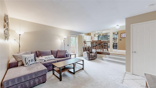 10517 Clermont Way, Thornton, CO 80233 - living room featuring carpet floors and tile patterned flooring