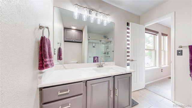 10517 Clermont Way, Thornton, CO 80233 - full bathroom with vanity and a stall shower