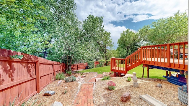 10517 Clermont Way, Thornton, CO 80233 - fenced backyard featuring a wooden deck