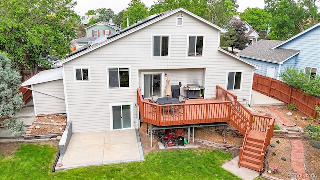 10517 Clermont Way, Thornton, CO 80233 - back of house with a patio, a deck, and stairs