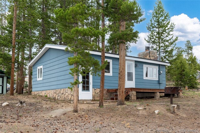 182 Colorado Dr, Tabernash, CO 80446 - ranch-style house with a chimney