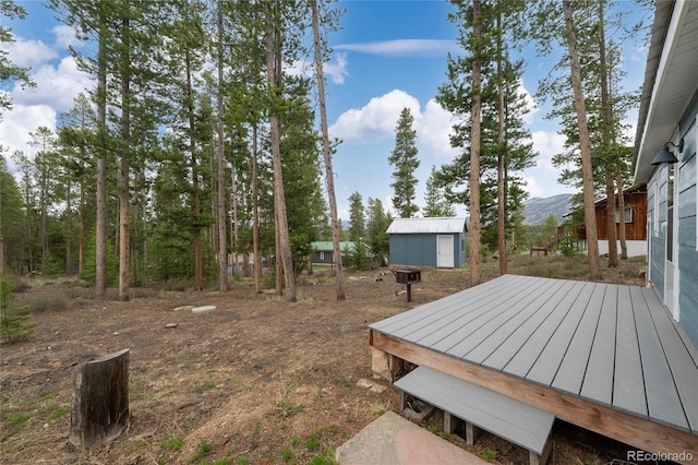 182 Colorado Dr, Tabernash, CO 80446 - view of yard featuring a deck with mountain view