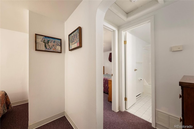 182 Colorado Dr, Tabernash, CO 80446 - hallway featuring carpet floors, arched walkways, and baseboard heating