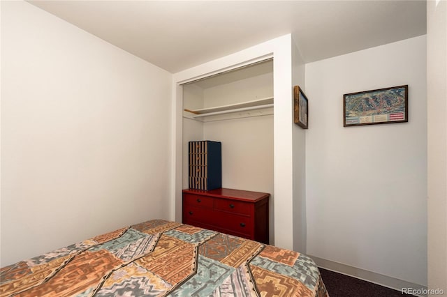 182 Colorado Dr, Tabernash, CO 80446 - bedroom featuring dark colored carpet and a closet