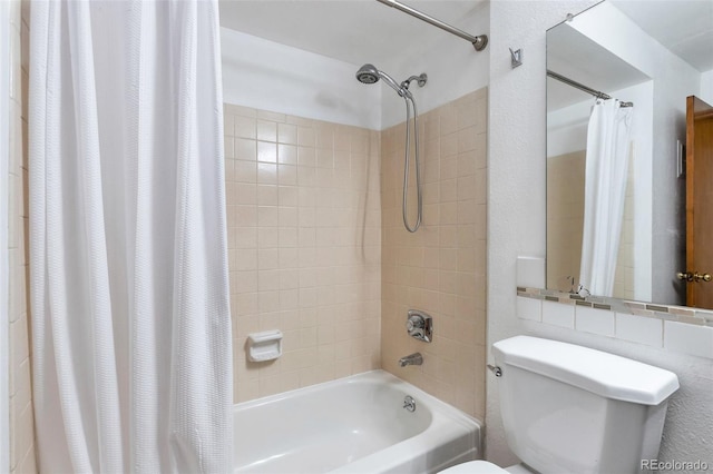 bathroom featuring toilet and shower / bathtub combination with curtain