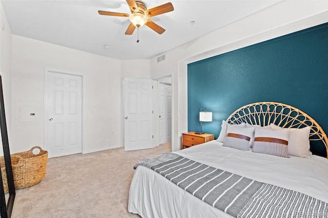 bedroom featuring ceiling fan and carpet floors