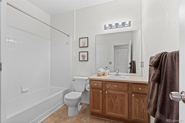 full bathroom with tub / shower combination, vanity, and toilet