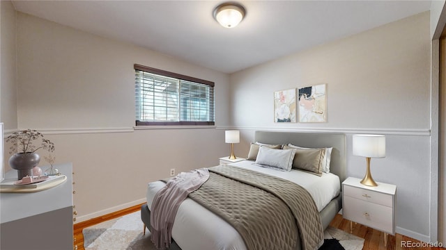 bedroom featuring hardwood / wood-style flooring