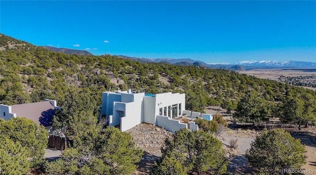 28700 County Road 304, Buena Vista, CO 81211 - view from above of property with a mountainous background and a heavily wooded area