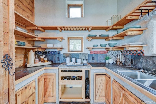 28700 County Road 304, Buena Vista, CO 81211 - kitchen with open shelves, tasteful backsplash, and tile countertops
