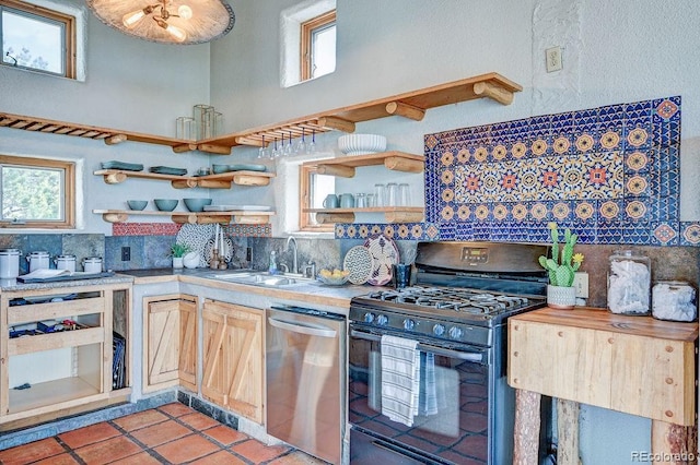28700 County Road 304, Buena Vista, CO 81211 - kitchen with black range with gas cooktop, dishwasher, open shelves, backsplash, and a high ceiling
