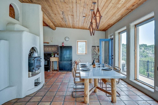 28700 County Road 304, Buena Vista, CO 81211 - dining space with wooden ceiling, plenty of natural light, and light tile patterned floors