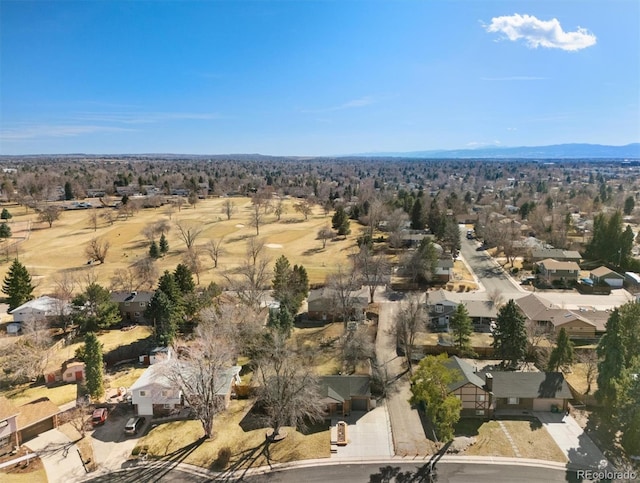 drone / aerial view featuring a residential view and a mountain view