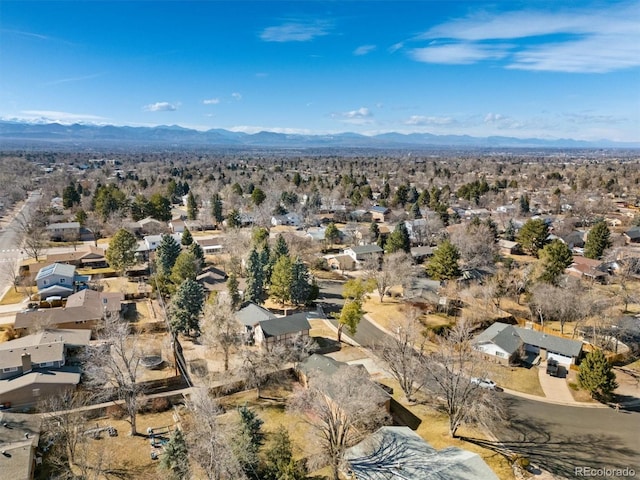 drone / aerial view with a residential view and a mountain view