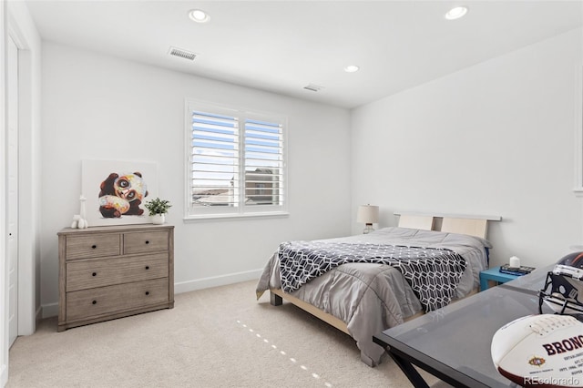 bedroom featuring carpet floors, recessed lighting, visible vents, and baseboards