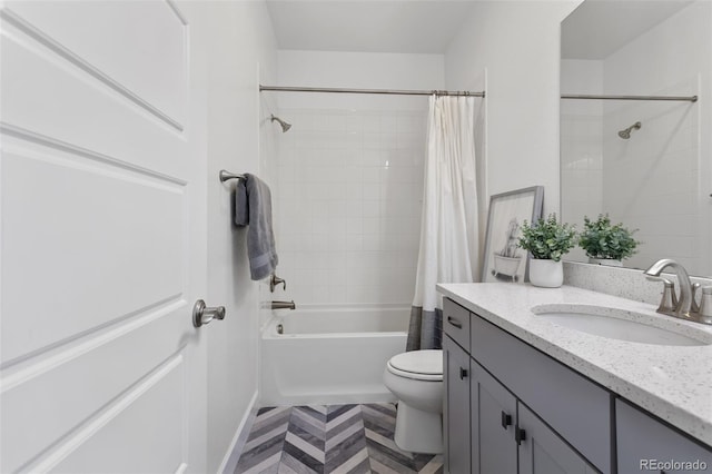 bathroom featuring shower / bath combination with curtain, vanity, and toilet