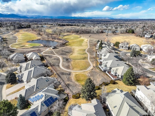 aerial view featuring a residential view, view of golf course, and a water and mountain view