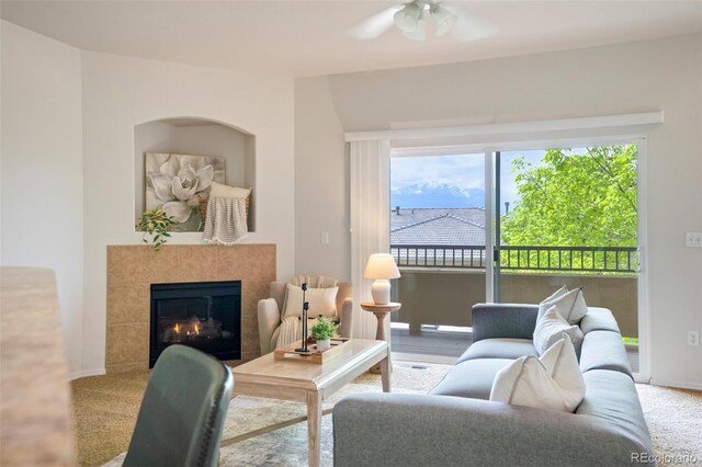 4323 Sammers Vw, Colorado Springs, CO 80917 - living area with plenty of natural light, a ceiling fan, and a fireplace