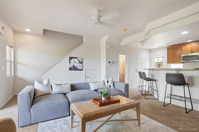 4323 Sammers Vw, Colorado Springs, CO 80917 - living area with light carpet, ceiling fan, recessed lighting, and baseboards