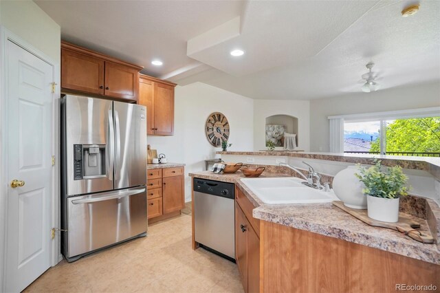 4323 Sammers Vw, Colorado Springs, CO 80917 - kitchen featuring appliances with stainless steel finishes, a sink, light countertops, recessed lighting, and brown cabinets