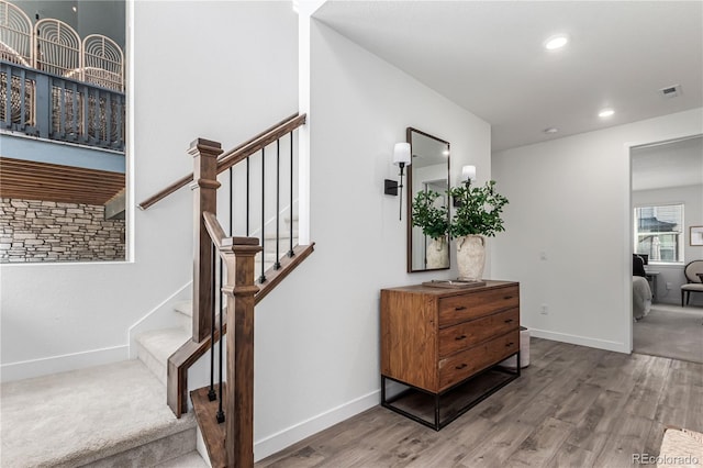 15774 W Girard Ave, Morrison, CO 80465 - staircase with recessed lighting, visible vents, baseboards, and wood finished floors