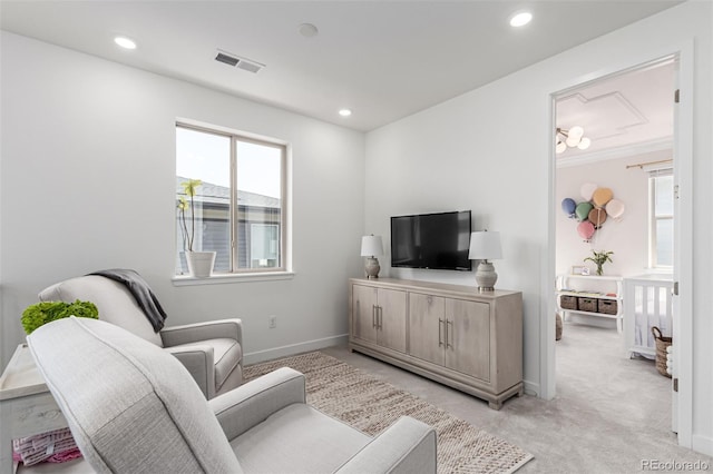 15774 W Girard Ave, Morrison, CO 80465 - living area featuring light colored carpet, visible vents, and recessed lighting