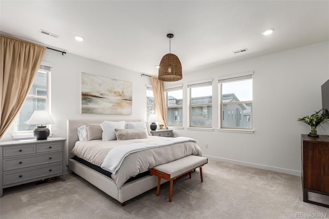 15774 W Girard Ave, Morrison, CO 80465 - bedroom with light carpet, baseboards, visible vents, and recessed lighting