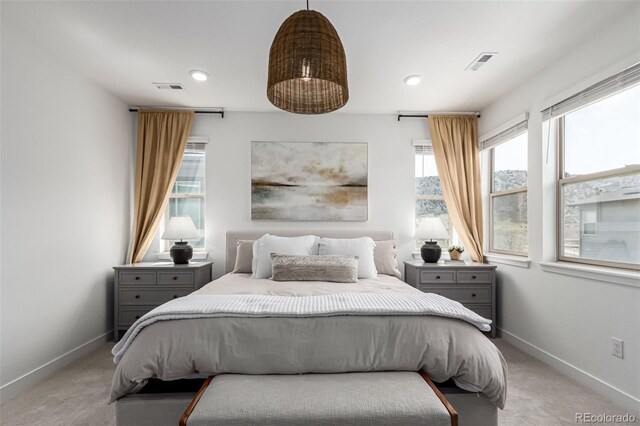 15774 W Girard Ave, Morrison, CO 80465 - bedroom featuring visible vents, baseboards, and light colored carpet