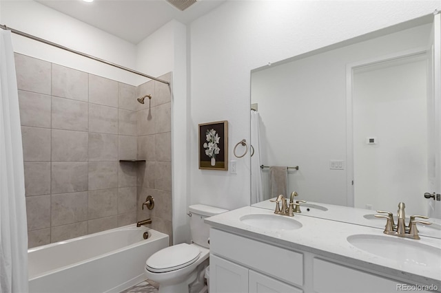 15774 W Girard Ave, Morrison, CO 80465 - bathroom featuring double vanity,  shower combination, a sink, and toilet